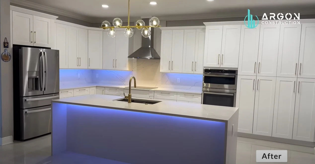 Kitchen remodel by Argon with white cabinets and island.